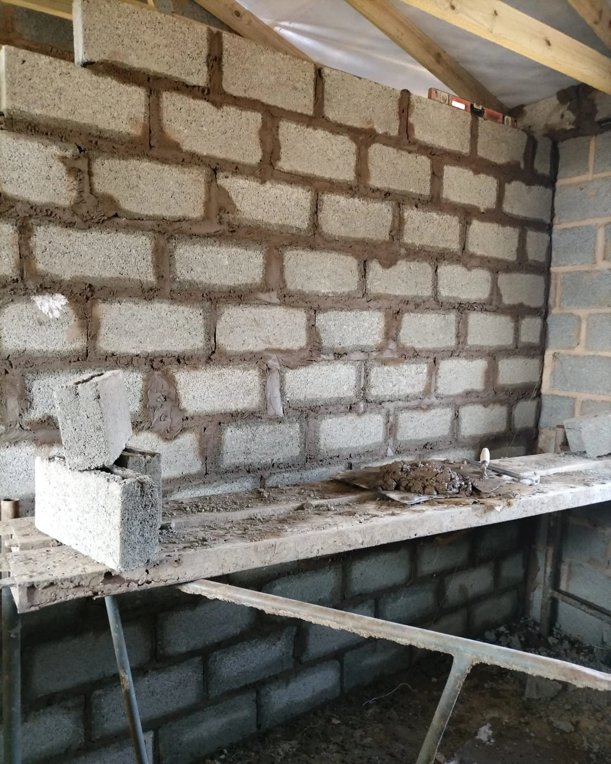 Interior block wall construction and mortar joints